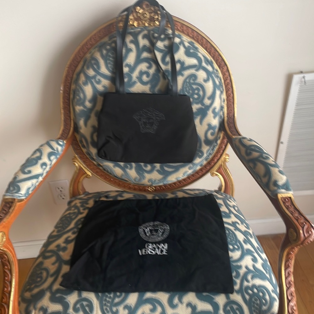 Like new Versace purse with original bag